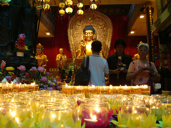 Praying for peace and good luck on Vesak Day