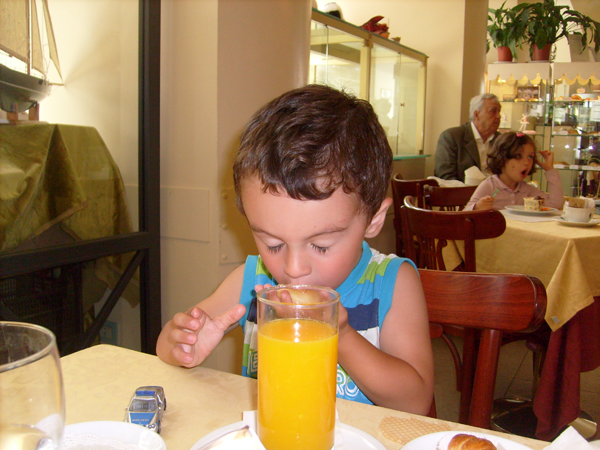 Paul Jules eating a small pizza.