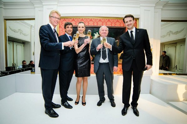The new Starwood Management team drinks a toast