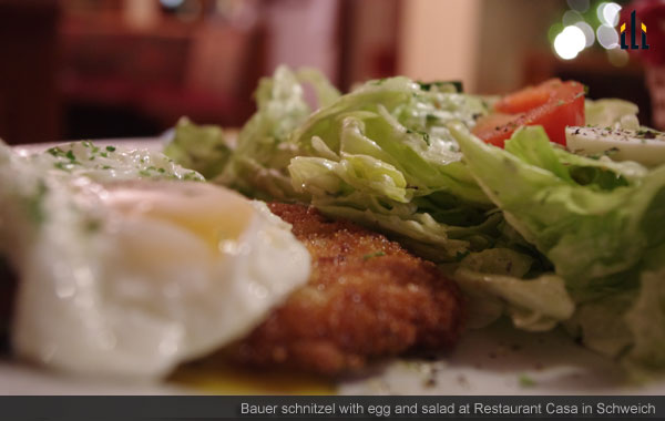 bauer schnitzel with egg and salad