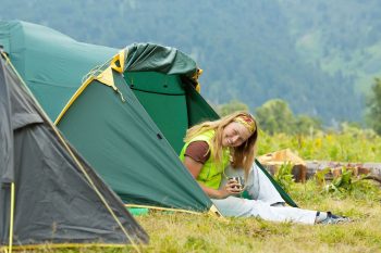 Girl gamping outdoors