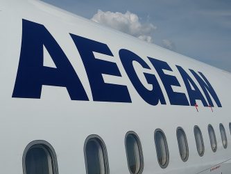 Aegean Airlines logo on a plane.