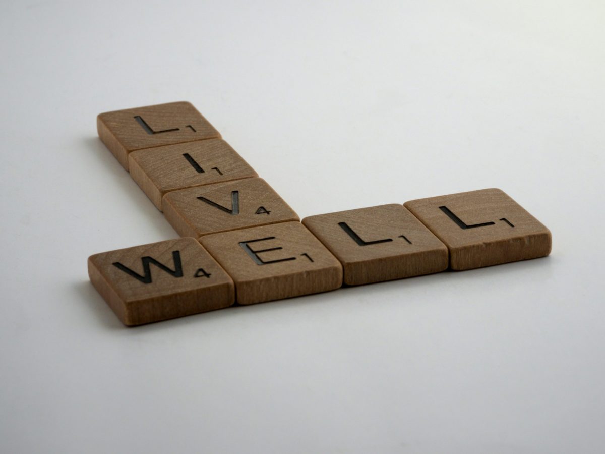 live well wooden Scrabble blocks on a white background