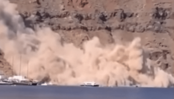 A landslide descended upon the serene Therasia in Santorini on Saturday, enveloping the Korfos port in a veil of dust.