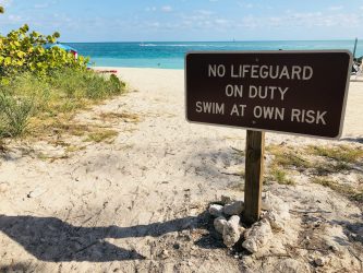 no lifeguard on duty sign