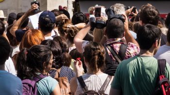 Tourists stuffed in front of a destination site