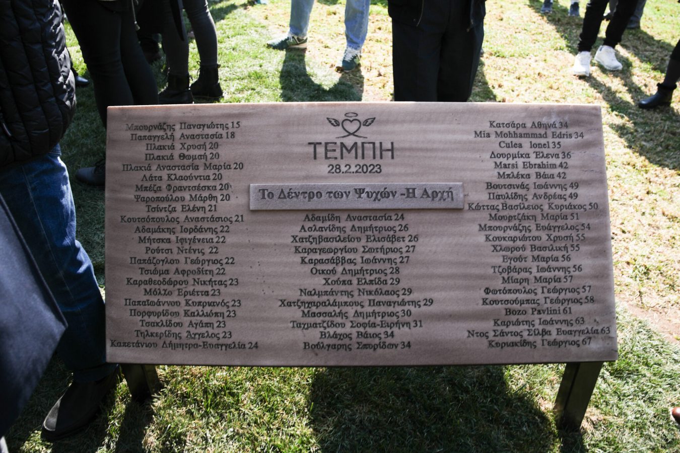 plaque with the names of the victims of the Tempi train tragedy.