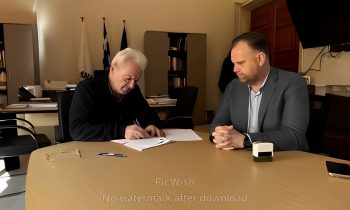 signing contract for Makassi Gallery in Heraklion