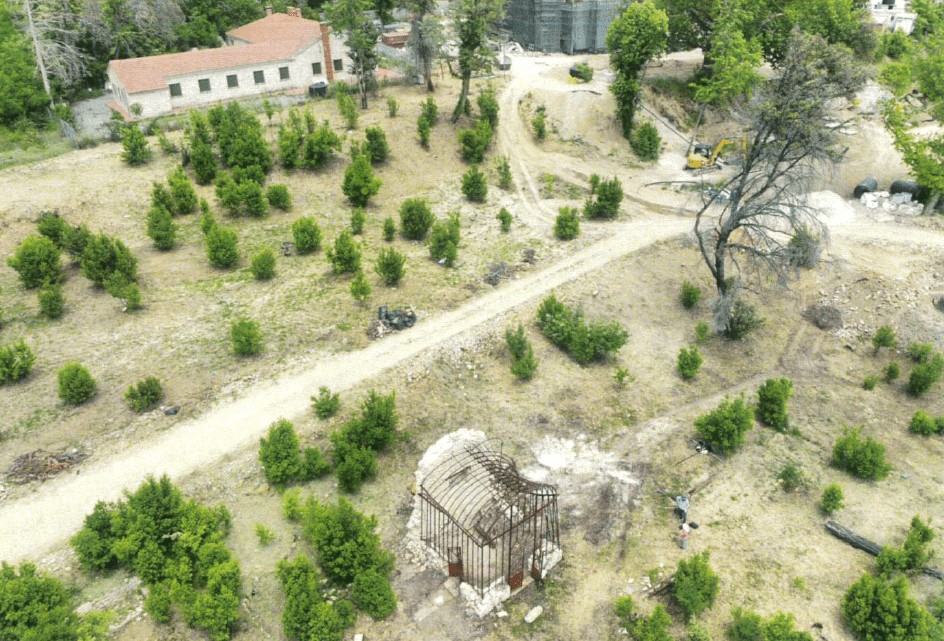 View of the greenhouse and the gardens under construction from above