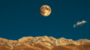 Full moon rising over Mount Juktas