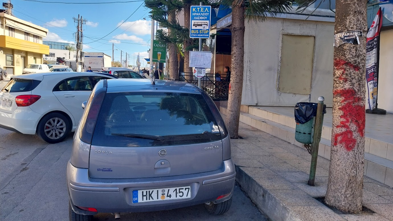 car parked at the bus stop