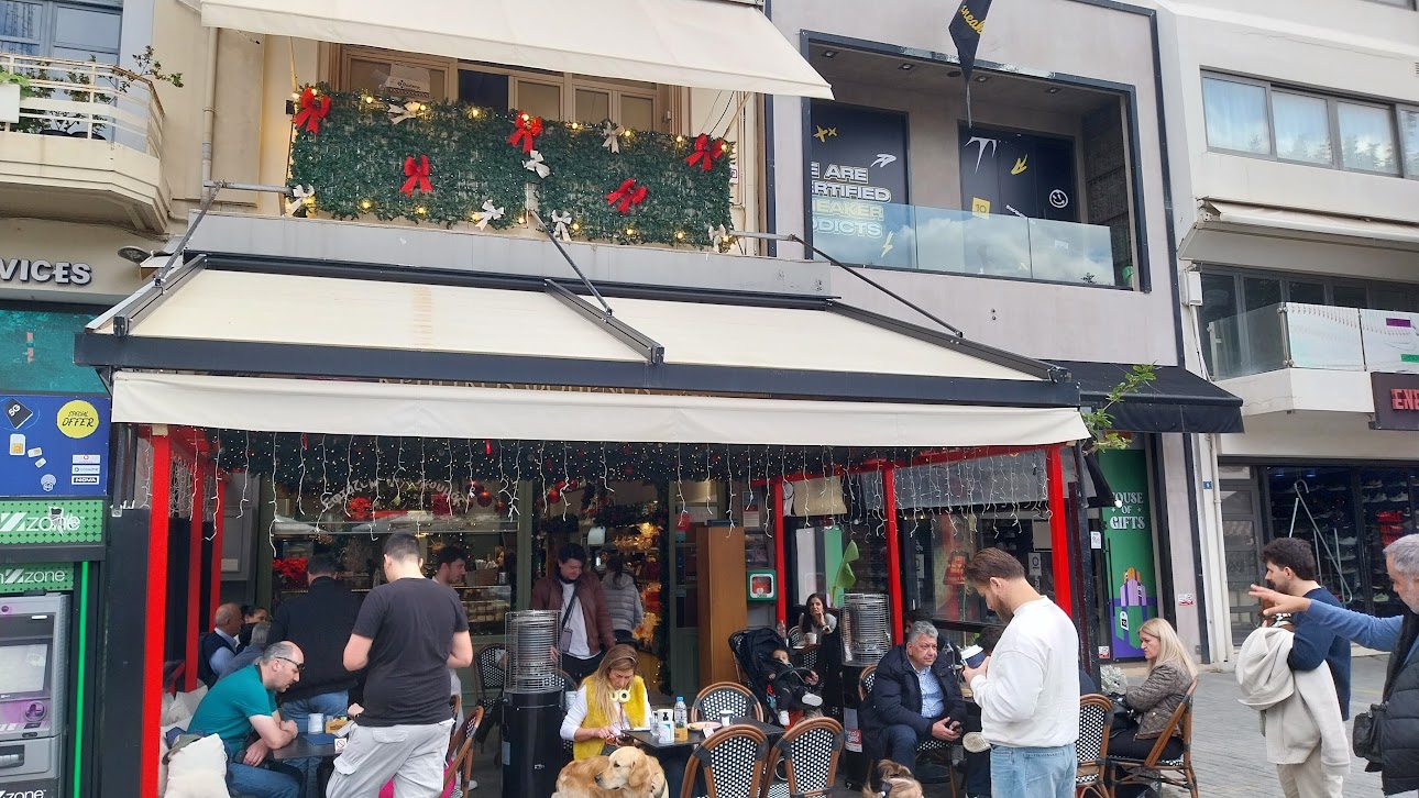A busy café on 25th of August Street.
